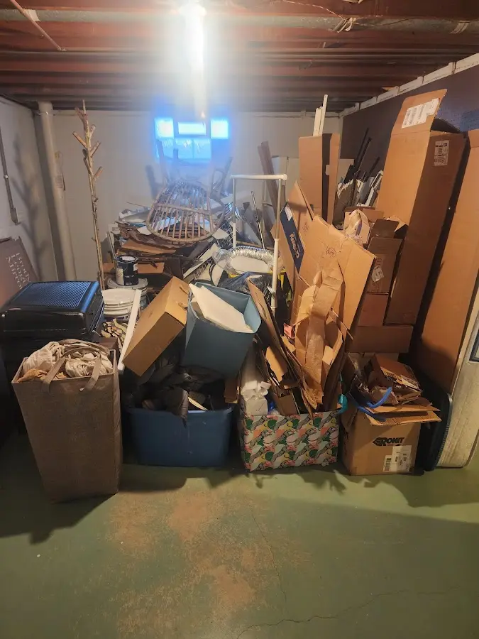 Roll-off dumpster container at job site for 15 Yard Dumpster Rental in Chickamauga